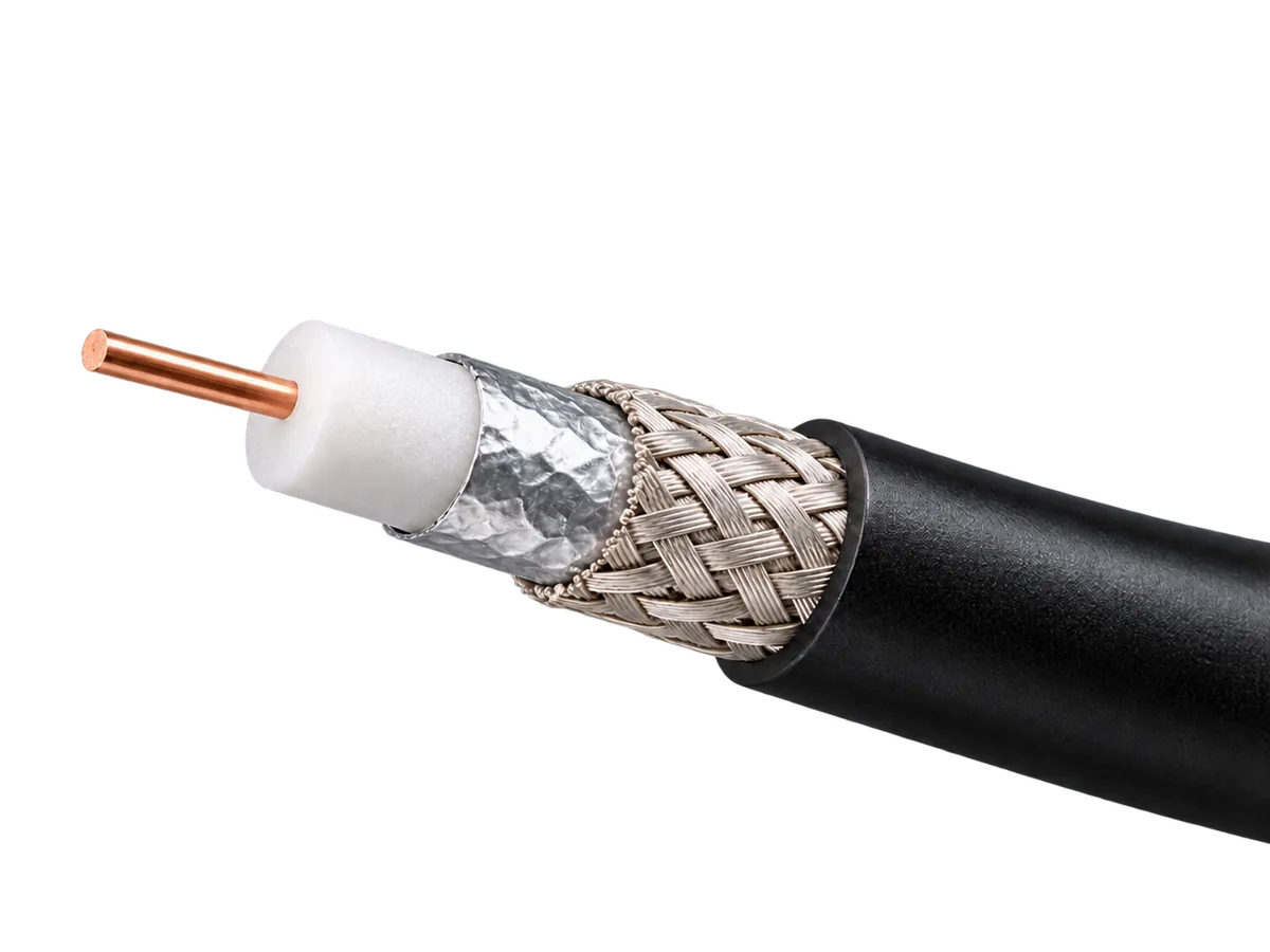 Coaxial cable cut back in steps: copper-coloured centre conductor, white dielectric, foil screen, woven braid and black outer jacket